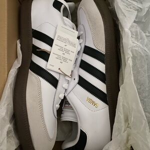 Samba Classic white with black stripe.